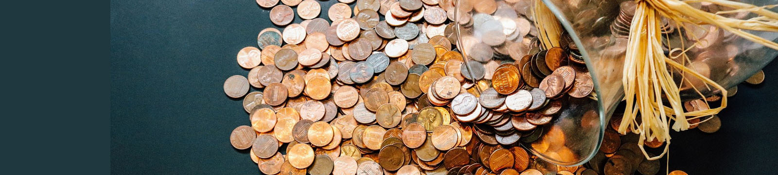 photo of pennies in a jar